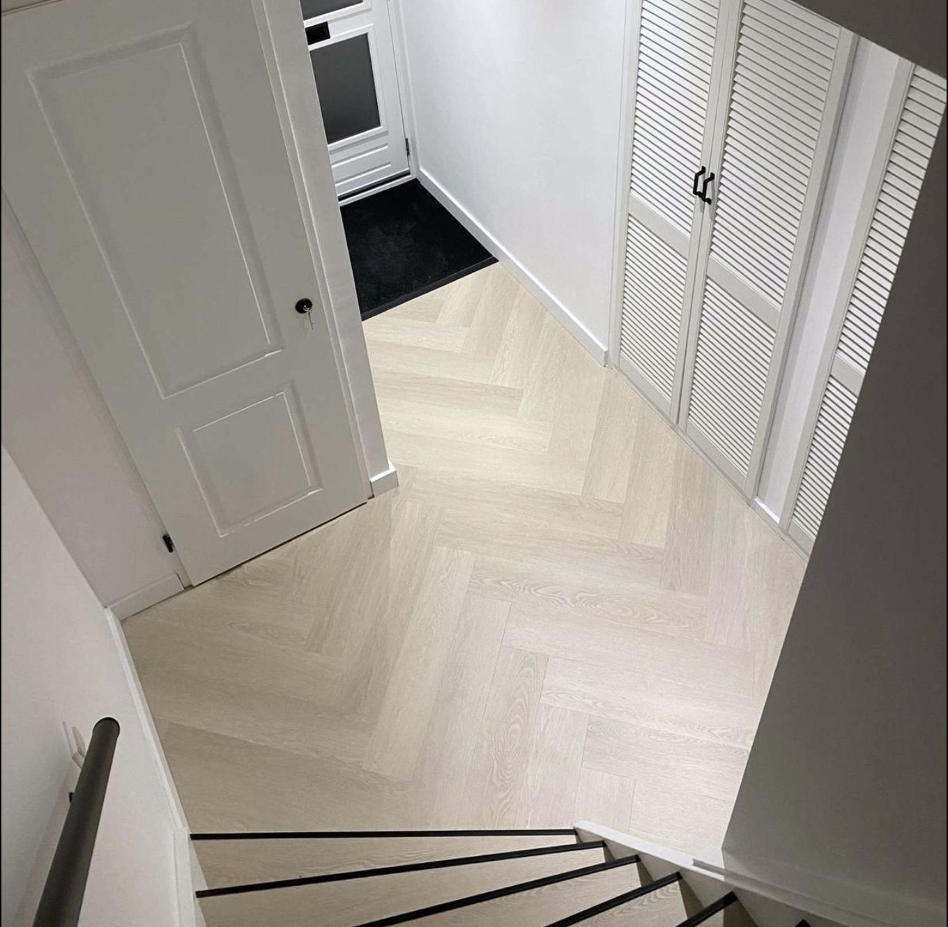 Julia licht beige eiken PVC Visgraat